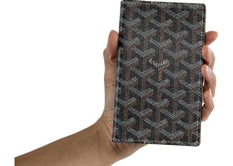 goyard passport holder black.